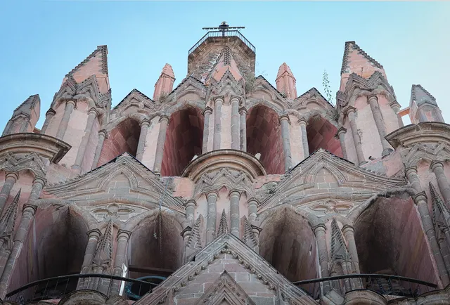 The pink stone facade of the parish church in San Miguel de Allende